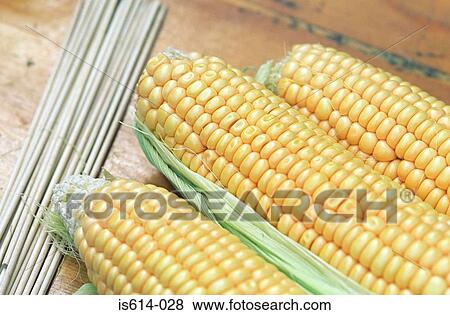 Three cobs of corn. View Large Photo Image Stock Photo - Three cobs of corn.. Fotosearch