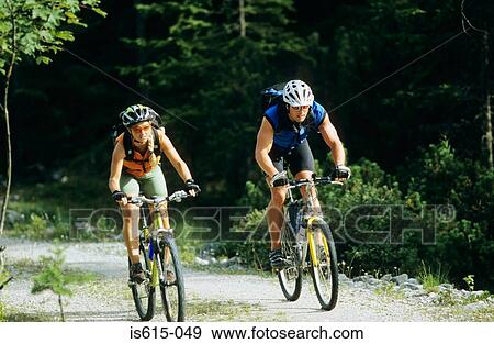 Cyclists riding together. View Large Photo Image Stock Photo - Cyclists riding together.. Fotosearch