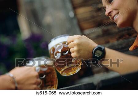 Enjoying pints of beer. View Large Photo Image Stock Photography - Enjoying pints of beer.. Fotosearch