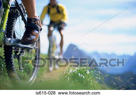 Ground level view of cyclists. View Large Photo Image Stock Photo - Ground level view of cyclists.. Fotosearch