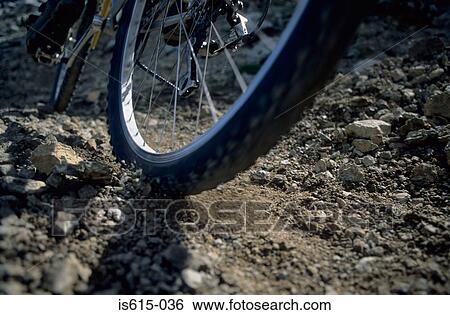 Ground view of moving cycle. View Large Photo Image Stock Photograph - Ground view of moving cycle.. Fotosearch