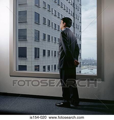 Businessman waiting in office View Large Photo Image Stock Image - Businessman waiting in office. Fotosearch