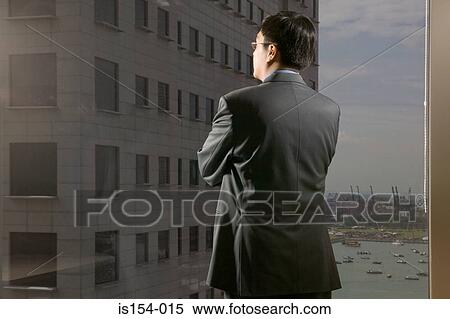 Businessman waiting in office View Large Photo Image Stock Photography - Businessman waiting in office. Fotosearch