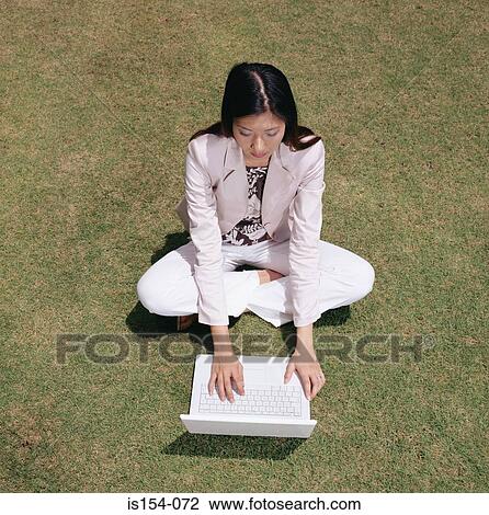 Businesswoman working in field View Large Photo Image Stock Image - Businesswoman working in field. Fotosearch