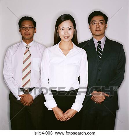 Three businesspeople View Large Photo Image Stock Image - Three businesspeople. Fotosearch
