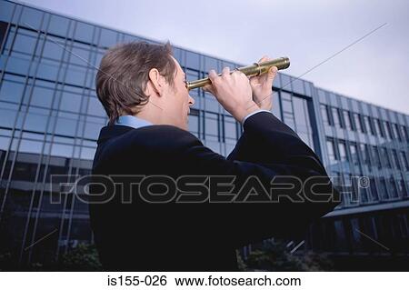 Businessman with telescope View Large Photo Image Stock Photograph - Businessman with telescope. Fotosearch