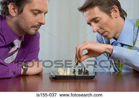 Office workers playing chess View Large Photo Image Stock Photo - Office workers playing chess. Fotosearch