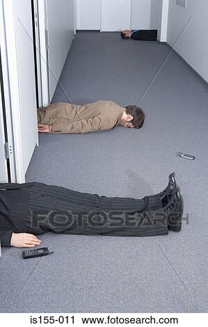 Three dead businessmen View Large Photo Image Stock Image - Three dead businessmen. Fotosearch