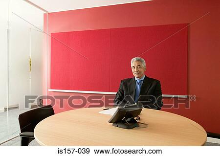 Asian businessman in office View Large Photo Image Stock Photo - Asian businessman in office. Fotosearch