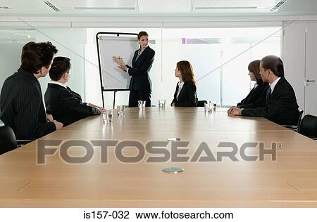 Stock Image - Businessman giving presentation. Fotosearch
