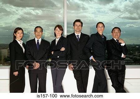 Stock Image - Businesspeople and cloudy sky. Fotosearch
