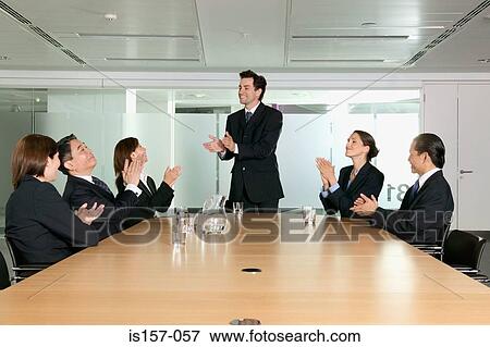 Businesspeople clapping View Large Photo Image Stock Photo - Businesspeople clapping. Fotosearch