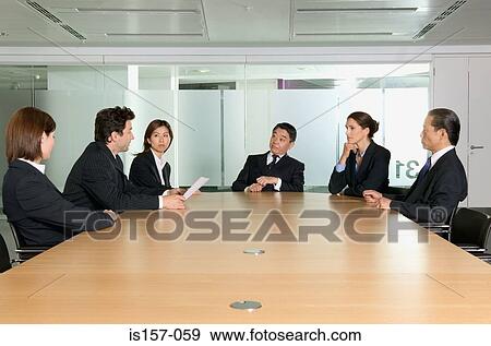Businesspeople in conference room View Large Photo Image Stock Photo - Businesspeople in conference room. Fotosearch