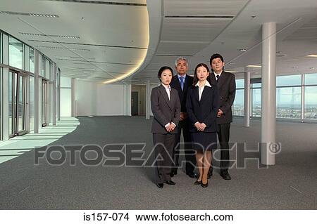 Picture - Businesspeople in empty office. Fotosearch