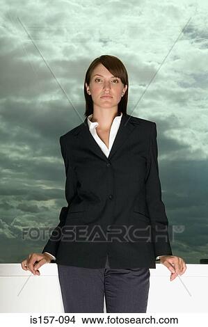 Businesswoman and cloudy sky View Large Photo Image Picture - Businesswoman and cloudy sky. Fotosearch