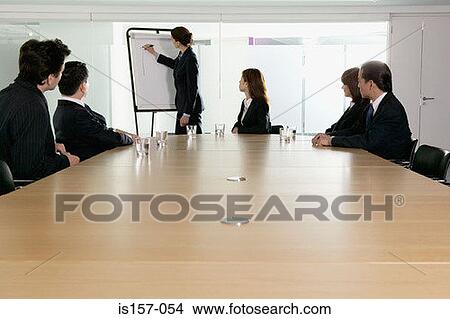 Picture - Businesswoman giving presentation. Fotosearch