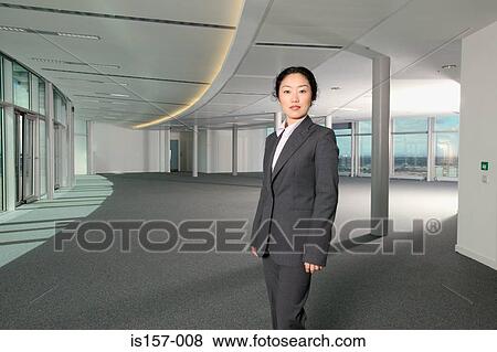 Stock Photo - Serious looking businesswoman. Fotosearch