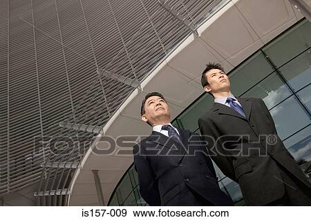 Two asian businessmen View Large Photo Image Stock Photo - Two asian businessmen. Fotosearch