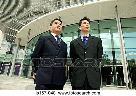 Stock Photo - Two asian businessmen. Fotosearch