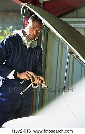 Stock Photograph - Mechanic portrait. Fotosearch