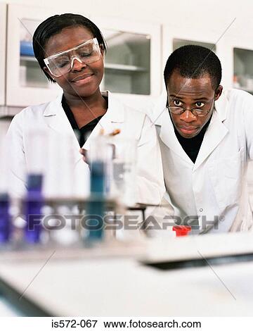 Stock Photo - Students in laboratory. Fotosearch
