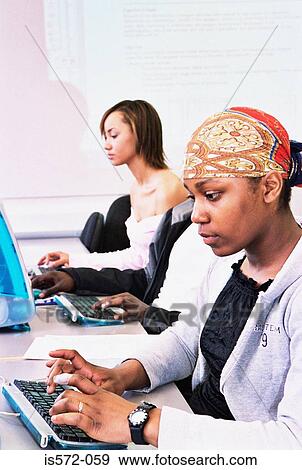 Stock Photo - Students using computers. Fotosearch