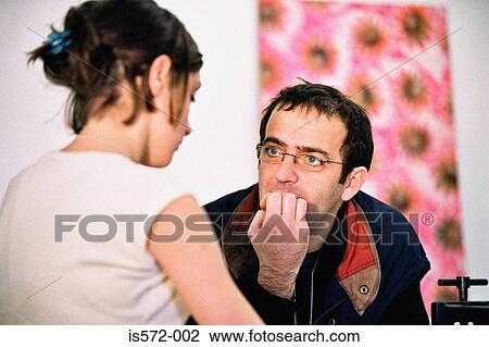 Stock Image - Teacher and student talking. Fotosearch