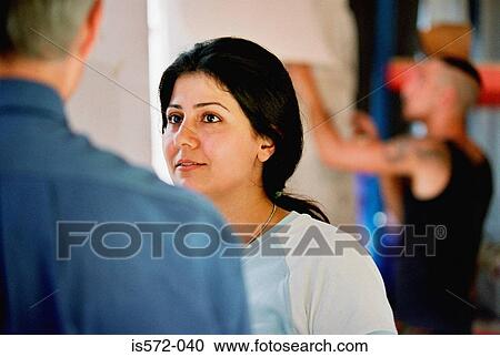 Teacher and student talking View Large Photo Image Stock Image - Teacher and student talking. Fotosearch