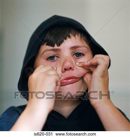 Boy making faces View Large Photo Image Stock Image - Boy making faces. Fotosearch