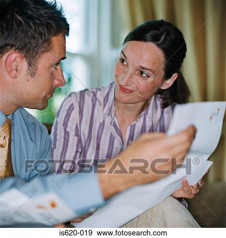 Couple planning their finances View Large Photo Image Stock Photo - Couple planning their finances. Fotosearch