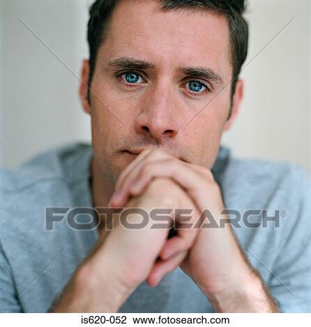 Portrait of a thoughtful looking man View Large Photo Image Stock Image - Portrait of a thoughtful looking man. Fotosearch