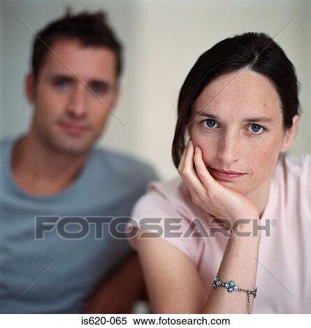Serious looking couple View Large Photo Image Stock Photography - Serious looking couple. Fotosearch