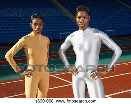 Female athletes on race track View Large Photo Image Stock Photo - Female athletes on race track. Fotosearch