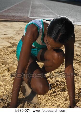 Female long jumper View Large Photo Image Picture - Female long jumper. Fotosearch