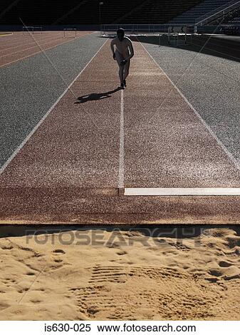 Stock Photography - Female long jumper. Fotosearch