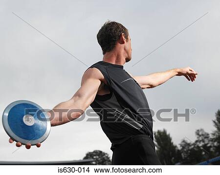Male discus thrower View Large Photo Image Picture - Male discus thrower. Fotosearch