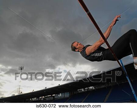Male high jumper View Large Photo Image Stock Image - Male high jumper. Fotosearch
