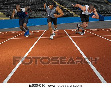 Sprinters on race track View Large Photo Image Stock Image - Sprinters on race track. Fotosearch
