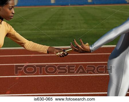 Women having a relay race View Large Photo Image Stock Photography - Women having a relay race. Fotosearch
