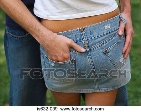 Couple with hands in back pockets View Large Photo Image Stock Photo - Couple with hands in back pockets. Fotosearch