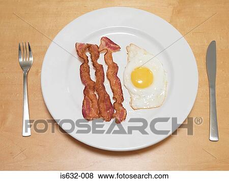 Fried egg and bacon View Large Photo Image Stock Photo - Fried egg and bacon. Fotosearch
