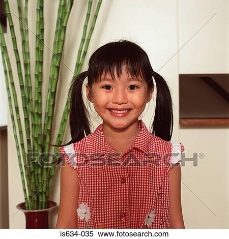 Asian girl with pigtails View Large Photo Image Stock Photography - Asian girl with pigtails. Fotosearch