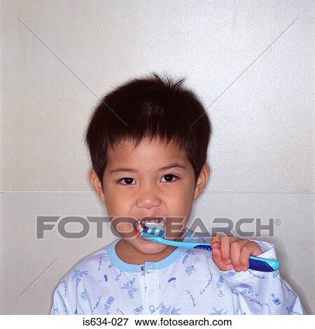 Boy brushing his teeth View Large Photo Image Stock Photo - Boy brushing his teeth. Fotosearch