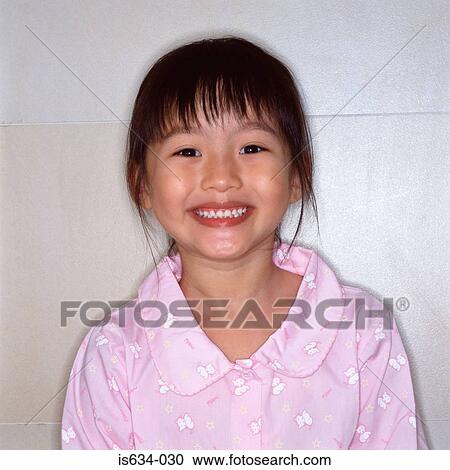 Stock Image - Portrait of a smiling girl. Fotosearch