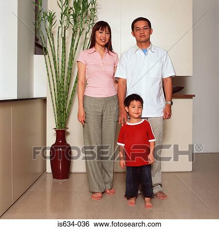 Portrait of an asian family View Large Photo Image Stock Photograph - Portrait of an asian family. Fotosearch