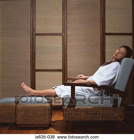 Stock Photo - Asian woman sleeping in spa. Fotosearch
