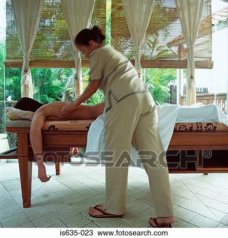 Stock Image - Man having a massage. Fotosearch