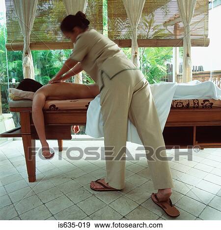 Man having a massage View Large Photo Image Stock Photo - Man having a massage. Fotosearch