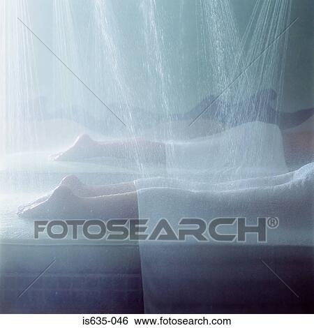 People showering in spa View Large Photo Image Stock Photograph - People showering in spa. Fotosearch