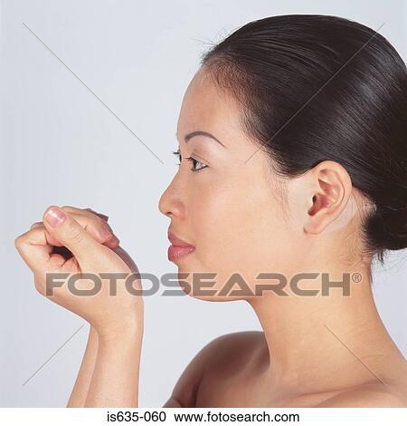 Stock Image - Portrait of an asian woman. Fotosearch
